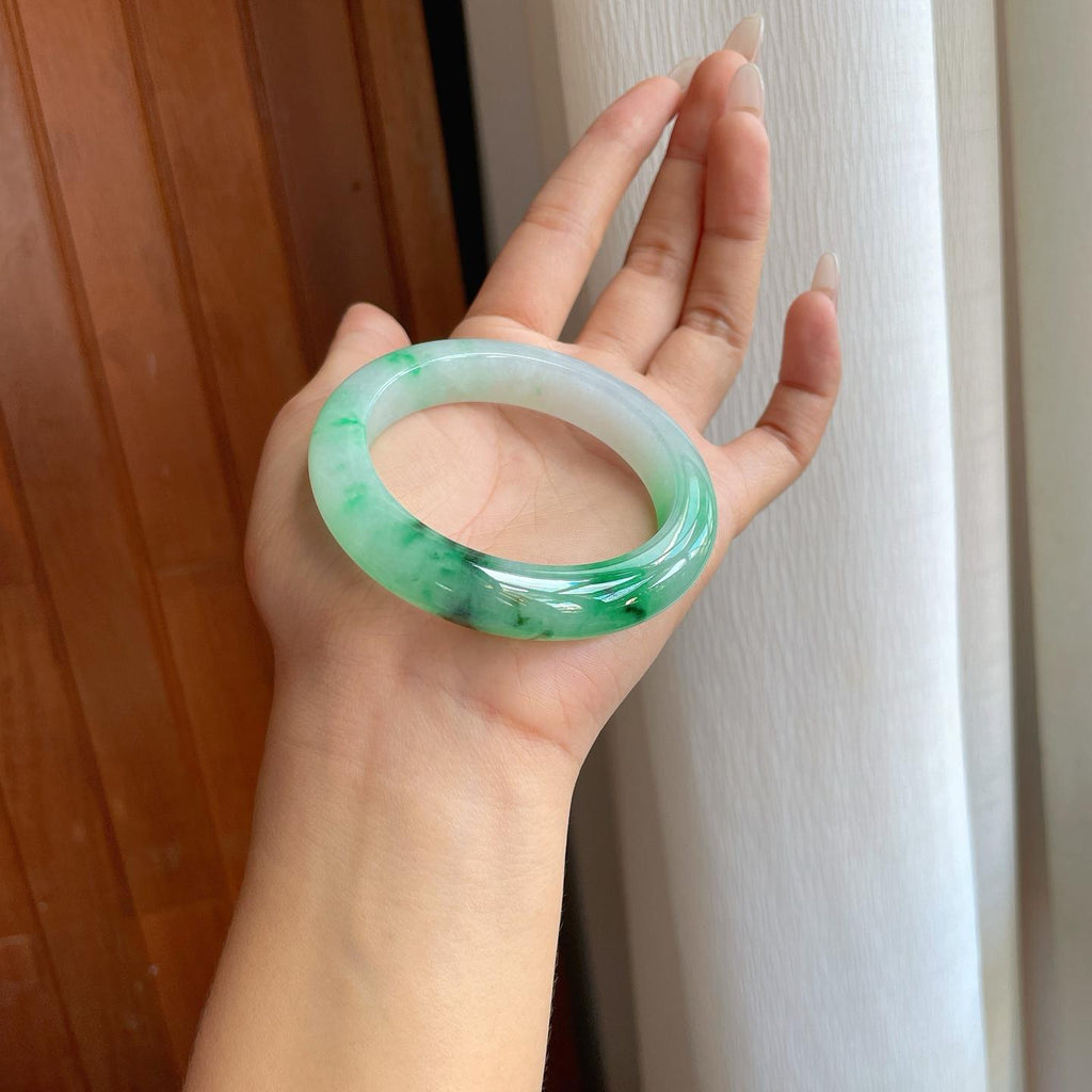 糯冰乌鸡花带色特色翡翠平安镯（54mm）（yc267502）