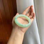 糯冰晴绿底飘花翡翠平安镯（56mm）（yc216040）