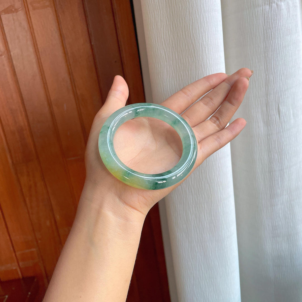 冰种飘花带黄翡翡翠圆条手镯（56mm）（yc402793）