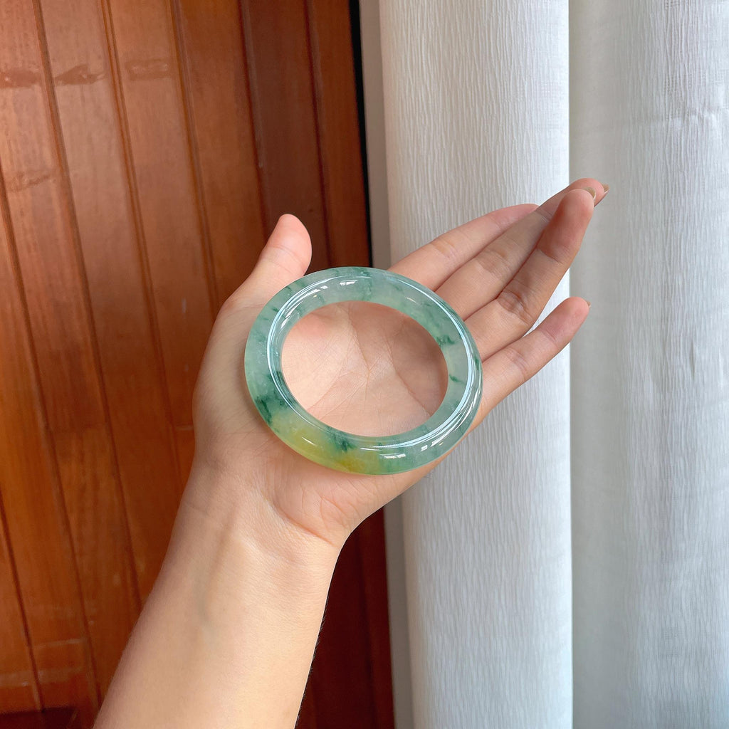 冰种飘花带黄翡翡翠圆条手镯（56mm）（yc402793）