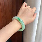 Vòng tay an bình bằng ngọc phỉ thúy Miến Điện tự nhiên loại A, đáy xanh trong, hoa bay, kích thước 55