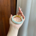 糯冰带黄翡翡翠平安镯（56.6mm）（yc272877）