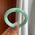糯冰带色翡翠平安镯(56.5mm)（yc424557）