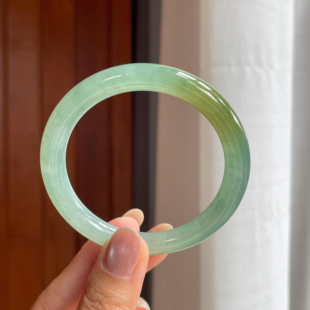 冰种晴底飘黄翡翠圆条手镯（55.2mm）（yc404806）