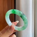 糯冰乌鸡花带色特色翡翠平安镯（54mm）（yc267502）