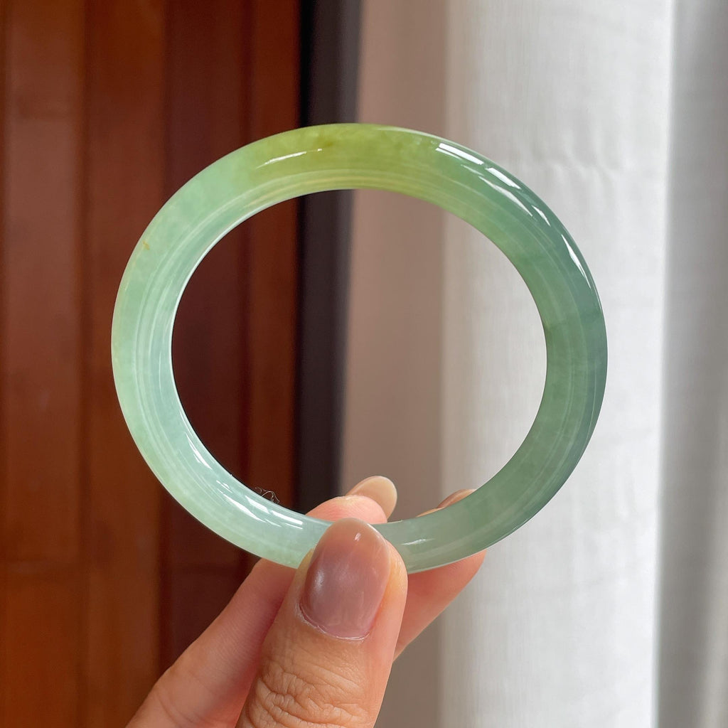 冰种晴底飘黄翡翠圆条手镯（55.2mm）（yc404806）