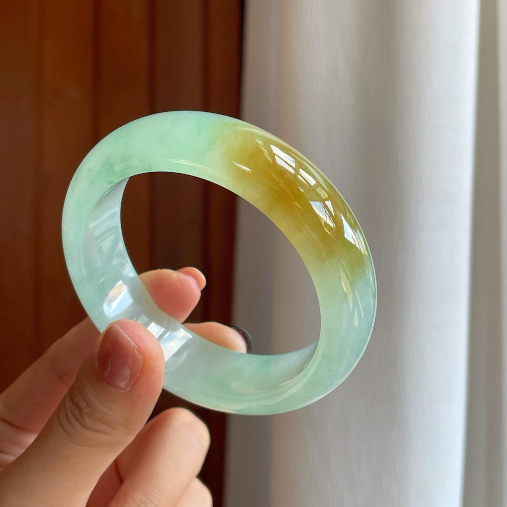 冰种晴绿底飘黄翡翡翠特色镯（56.5mm）（yc278062）