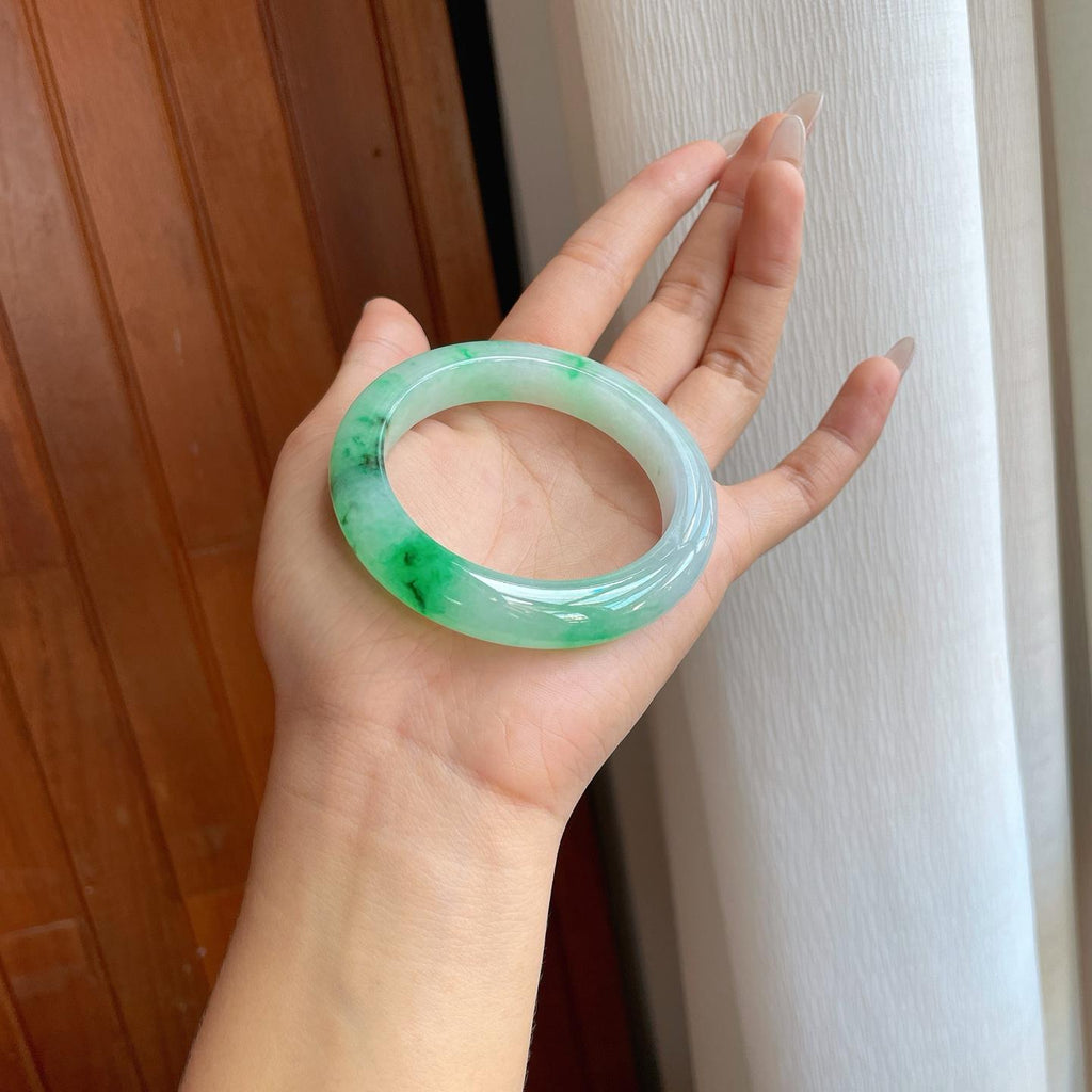 糯冰乌鸡花带色特色翡翠平安镯（54mm）（yc267502）